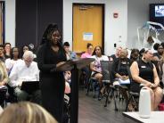 teen speaks at podium