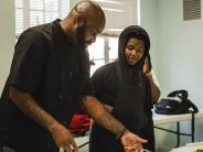 Chef Carl Cooking with a Student